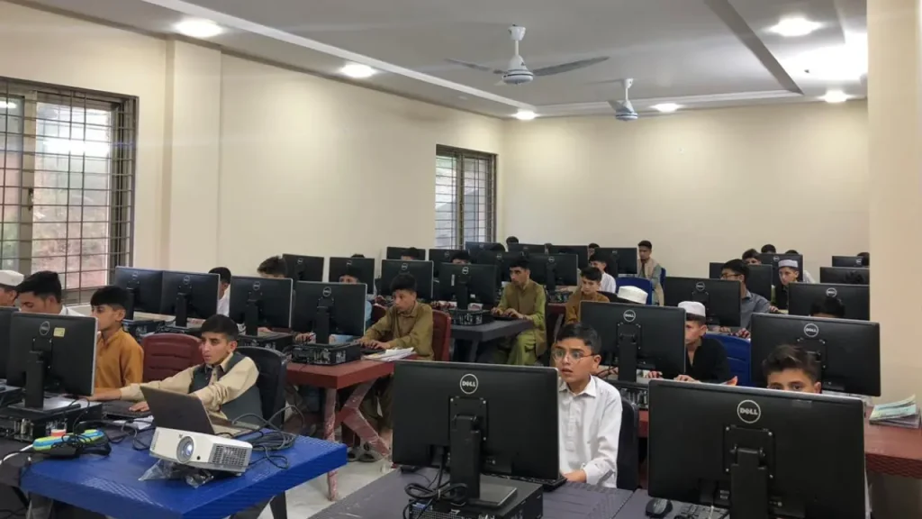 children learning digital skills at Parwarish Home computer lab